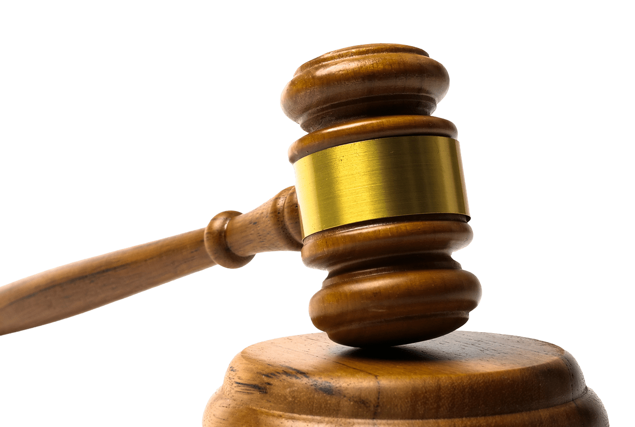 Wooden gavel on a black background.